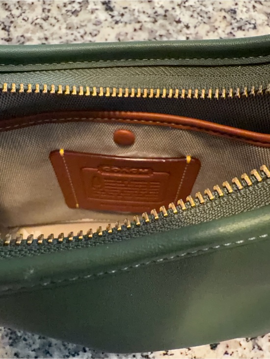 Coach Handbags - Length 9 inches
• Height (top to bottom): 7 inches.
Strap drop 18 inches